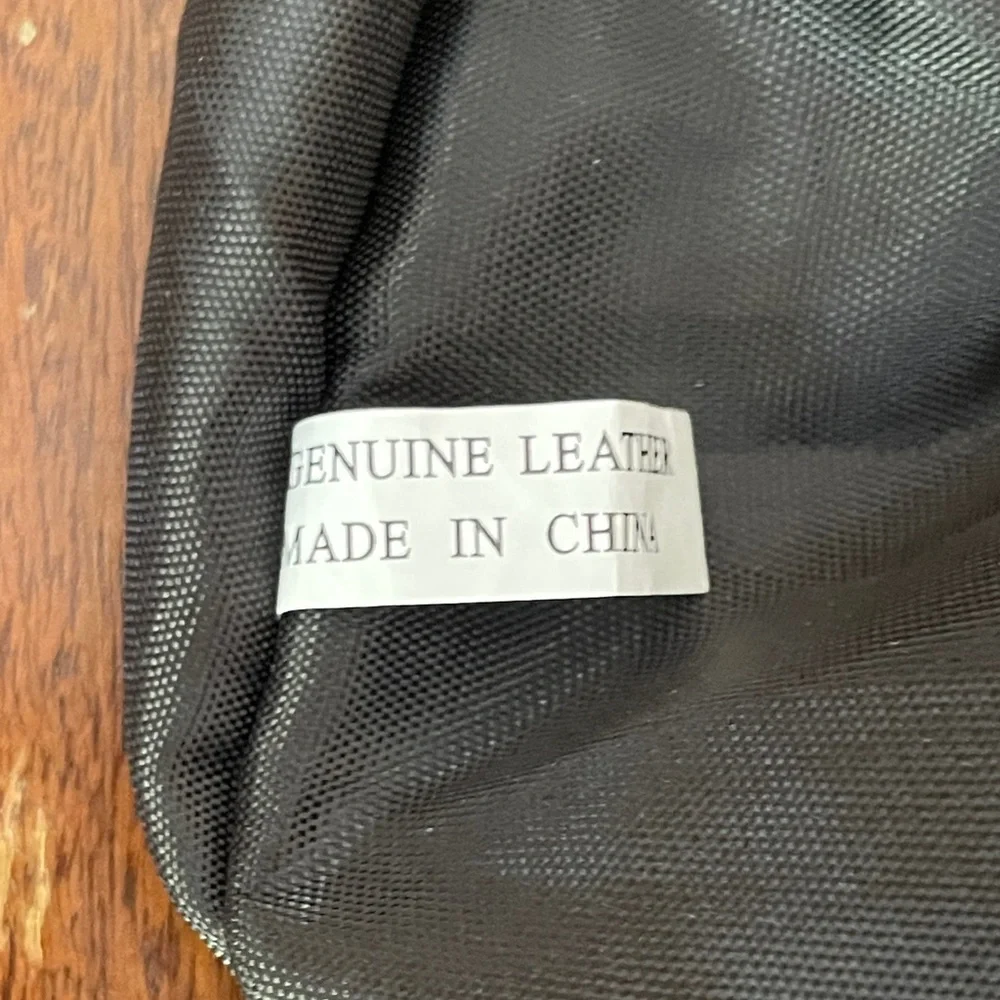 Excelled Collection Black Leather Hobo bag w/ Metal Grommets